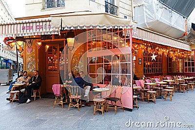 Mon Creme, a Parisian cafe decorated with flowers all year and located in the quiet rue Montmartre in the 2nd district Editorial Stock Photo