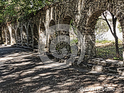 Arches in the Grounds of the Mon Repose Palace on the Greek Island of Corfu Editorial Stock Photo