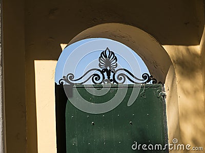 Ironwork in the Grounds of the Mon Repose Palace on the Greek Island of Corfu Editorial Stock Photo