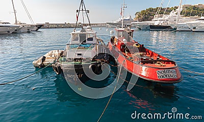 Monaco, Monaco - July 08 2008: Small pilot and tug boat in the Monaco harbor.. Editorial Stock Photo