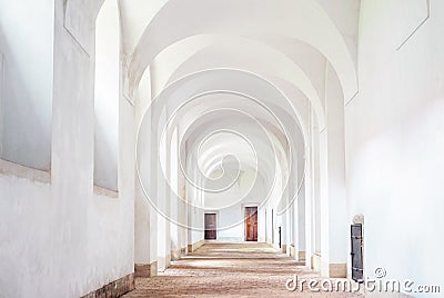 Monastery interior hallway cloister white clean archway, Plasy Stock Photo