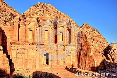 The Monastery (El Dayr) in Petra Ancient City in a Golden Sun Stock Photo