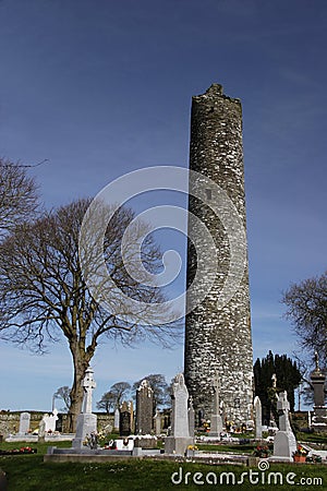 Monastic tower in grave yard, Stock Photo