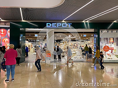 View on store front of Depot home accessories products company in german shopping mall Editorial Stock Photo