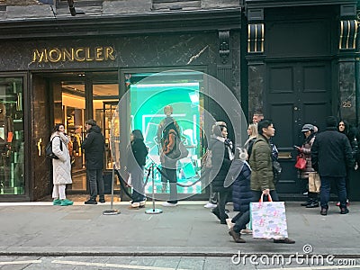 Moncler Italian fashion shop in London, Bond street, England during Christmas time 2023 Editorial Stock Photo