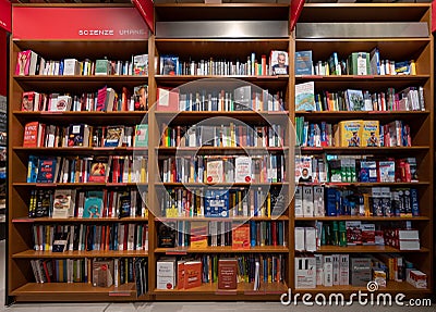 Bookshelf with books bookshop in Librerie.coop Editorial Stock Photo