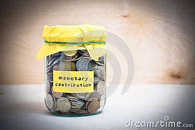 Monetary contribution Stock Photo