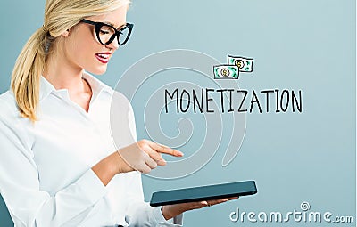 Monetization text with business woman Stock Photo