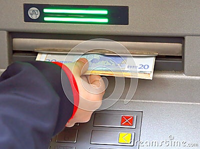 Money from ATM automatic cash machines Stock Photo