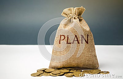 Money bag with coins and the word Plan. Personal financial planning concept. Management of the family budget. Savings and Stock Photo