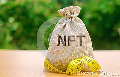 Money bag NFT - non-fungible token. Digitally represented product or asset. Selling digital assets and art through auctions. Stock Photo