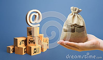 Money bag, stack of boxes and email internet symbol. Online Internet distribution of goods. E-commerce. Network marketing Stock Photo