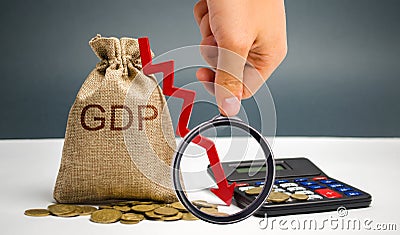 Money bag with the word GDP and down arrow. Decline and decrease of GDP - failure and breakdown of economy and finances leading to Stock Photo