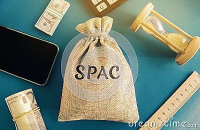 Money bag with the word SPAC - Special purpose acquisition company. Simplified listing of company, merger bypassing stock exchange Stock Photo