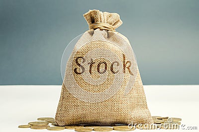 Money bag with the word Stock and coins. Trading on the stock exchange. Investment portfolio. Capital gains. Common and preferred Stock Photo