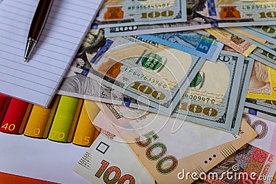 Money banknotes: USD and UAH. UKrainian Hryvnias and US Dollar exchange. Currency Stock Photo