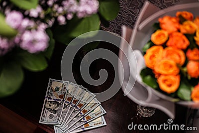 money the best decoration for a girl is money and flowers Stock Photo