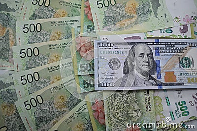 Money bills, the Argentine peso and US dollars Stock Photo