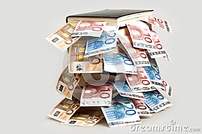 Money in books Stock Photo