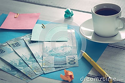 Brazilian money, reais banknotes with blank note cards Stock Photo