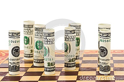 Money on chess board Stock Photo