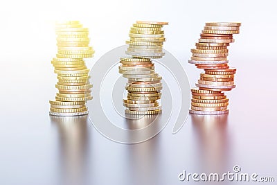 Money concept: Coins tacked on each other. Inflation, currency, savings, money Stock Photo