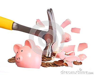 Money Concept. Hammer breaking Piggy Bank Stock Photo