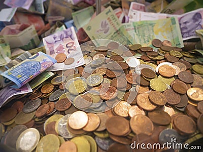 Money from different countries for charity. Generosity. Stock Photo