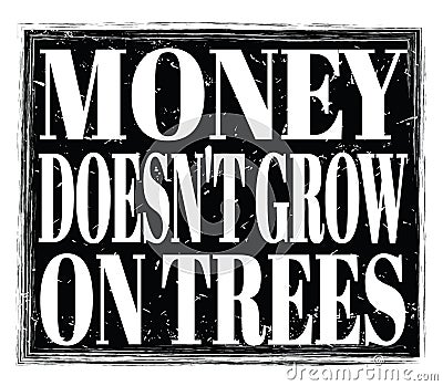 MONEY DOESN`T GROW ON TREES, text on black stamp sign Stock Photo