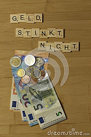 Money doesnt stink, word in german Geld stinkt nicht Stock Photo