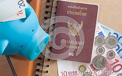 Money euro banknotes,coins,piggy bank,wallet and passport Stock Photo
