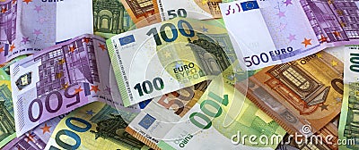 Money euro cash background banner. Various paper notes of European currency close up. Banknotes 50, 100, 500 Euros Stock Photo