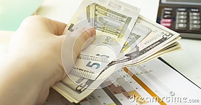 finances concept - close up of womans cupped hands showing euro coins Stock Photo