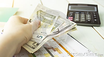 money and finances concept - close up of womans cupped hands showing Stock Photo