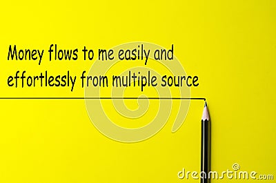 Money flows to me easily and effortlessly from multiple source text on yellow background. Wealth and health affirmation concept Stock Photo
