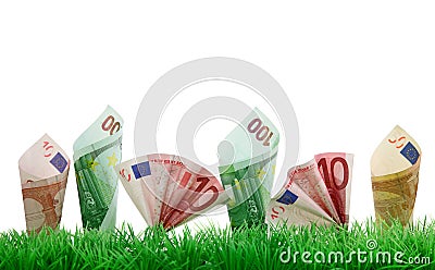 Money growing in grass Stock Photo