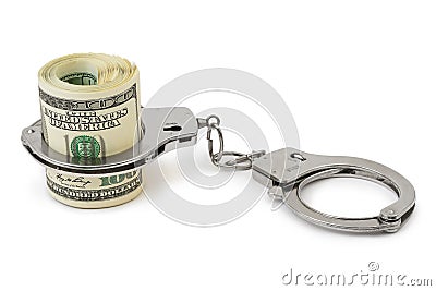 Money and handcuffs Stock Photo
