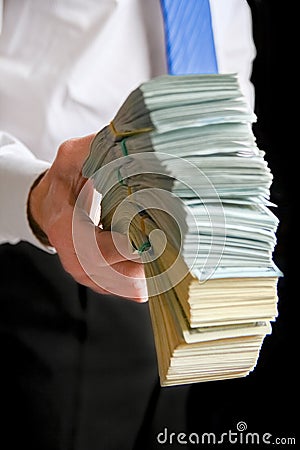 A money in the hands of a businessman in a crisis raising business concept bank worker Stock Photo