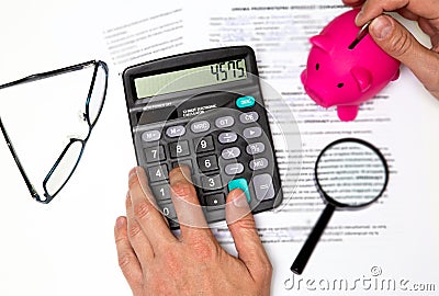 Money, home, finance and relationships concept - Doctor holding out your piggy bank wanting payment Savings Pay Bill,Stethoscope f Stock Photo