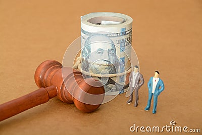 the money judge's gavel stands ready to deliver justice, weighing the actions of a corrupt businessman Stock Photo