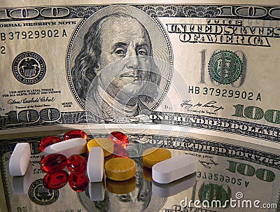 Money and Pills Stock Photo