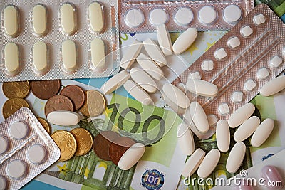 Money and pills. Medicine concept. Euro cash. Stock Photo