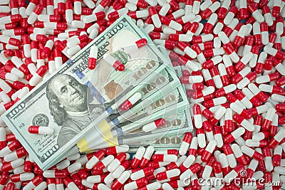 Money with pills Stock Photo