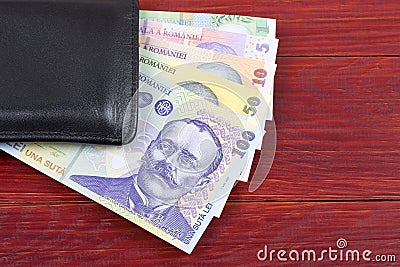 Money from Romania in the black wallet Stock Photo