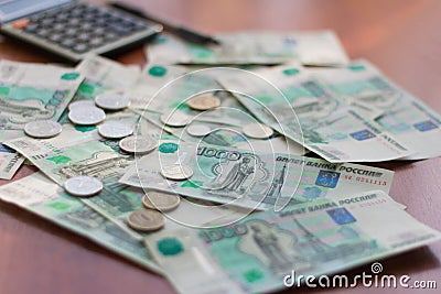 Money, Russian bills and coins are on the table Stock Photo