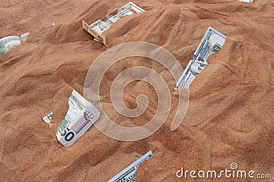 Money in Between Sands Stock Photo