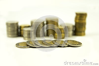 Money, stack of coins on white background. Saving money concept. Growing business. Confidence in the future. Stock Photo