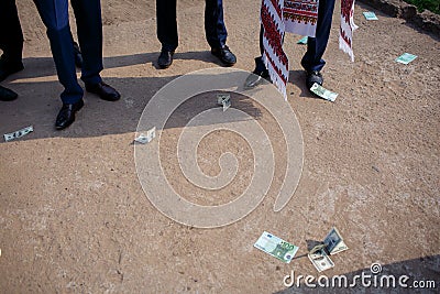 Money thrown to the ground Stock Photo