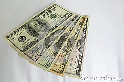 Money on a white background. Different denominations of the dollar. Stock Photo