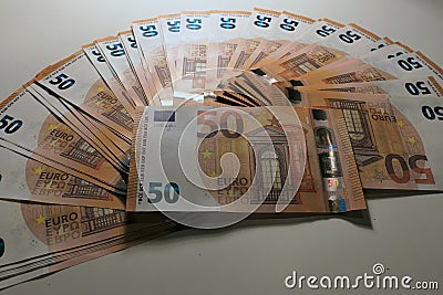 Money on the white table Stock Photo